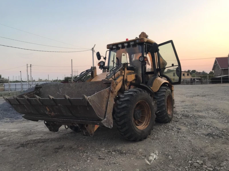 BEL-DOZER BD* Экскаватор-погрузчик