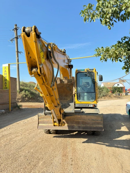 LGCE E* Экскаватор колесный