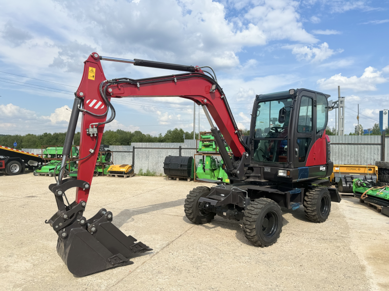 Мини-экскаватор QUADTRAC E60W (6 т, кабина, А/С, квикаплер, поворотная стрела, траншейный ковш)