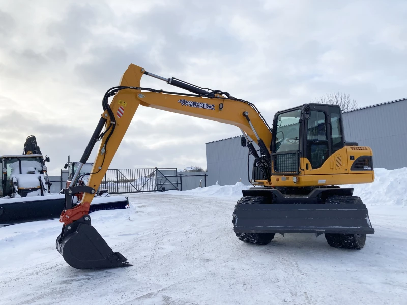 Мини-экскаватор QUADTRAC E130WH (12т, кабина, квикаплер, Желтый 2023 год)