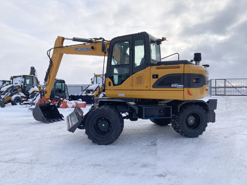 Мини-экскаватор QUADTRAC E130WH (12т, кабина, квикаплер)