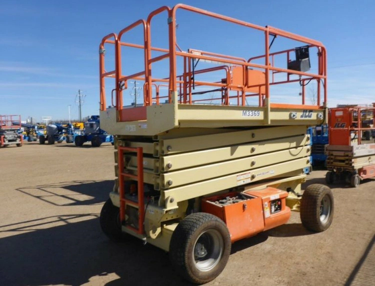 Ножничный подъемник JLG M3369LE, грузоподъемность 450 кг, рабочая высота 12.06 м, тип питания Электрический