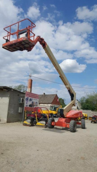 Самоходный коленчатый подъемник JLG E 600 JP, грузоподъемность 230 кг, рабочая высота 20.39 м, тип питания Электрический