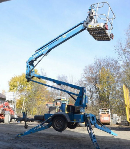 Прицепной подъемник коленчатого типа GENIE GЕNIE TZ-34/20, грузоподъемность 227 кг, тип питания Электрический, размер платформы 0.68×1.12 м