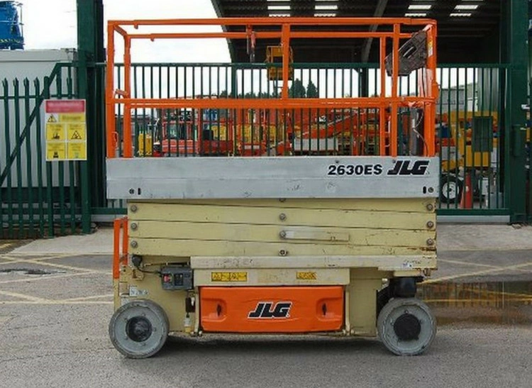 Ножничный подъемник JLG 2630ES, грузоподъемность 230 кг, рабочая высота 9.77 м, тип питания Электрический